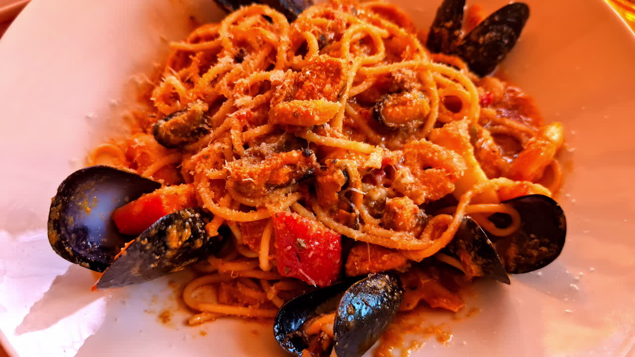 Delicious and ornate gastronomic dish of spaghetti with clams, typical Greek food