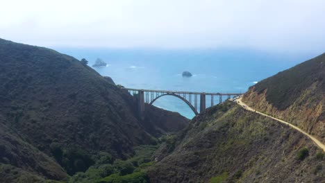 bixby bridge on scenic big sur california coastline landscape, aerial