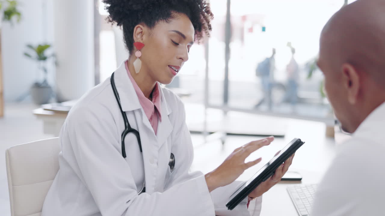 Doctor woman, tablet and conversation with man