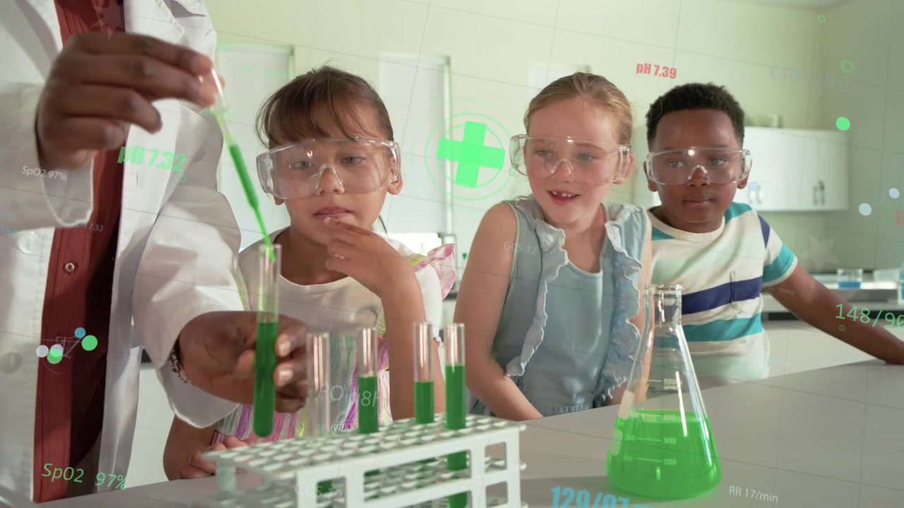 Teacher dipping dropper into green liquid teaching science, filling tubes, green pluses over bench