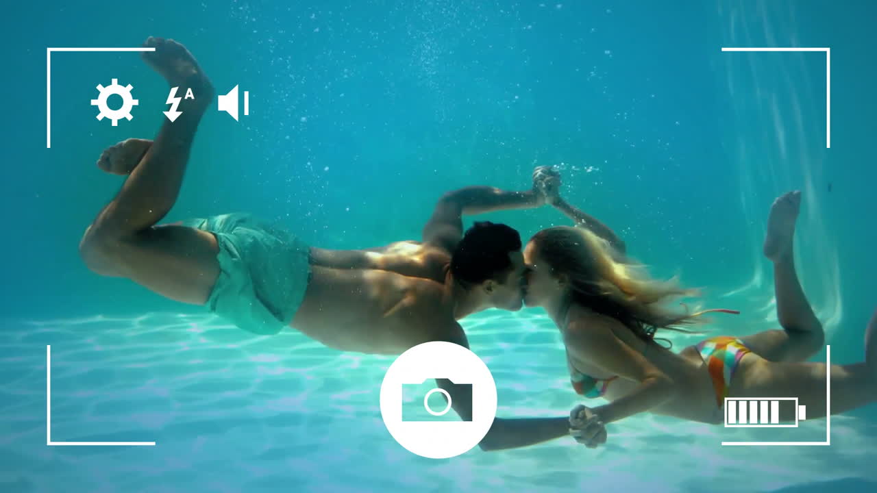 Taking photos of a couple on a digital camera