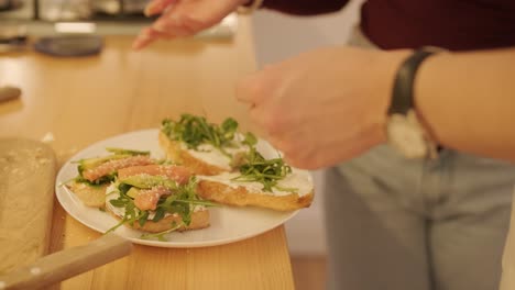 Loving Couple Making a Sandwich in Kitchen-Living Room