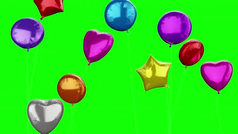 Shiny-colorful-party-balloons-flying-with-green-background