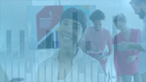 animation of graphs over happy caucasian woman in office