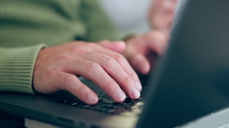 Laptop, keyboard and hands typing with internet