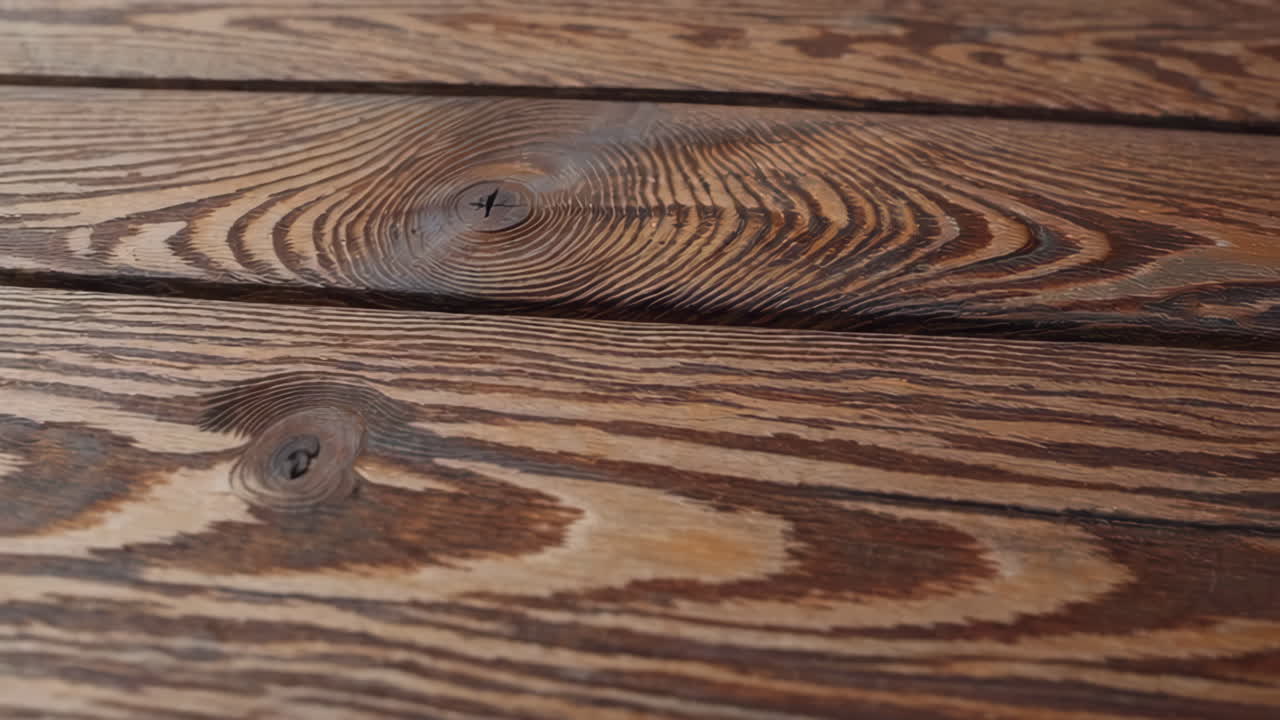 Close-up view of a wooden table surface
