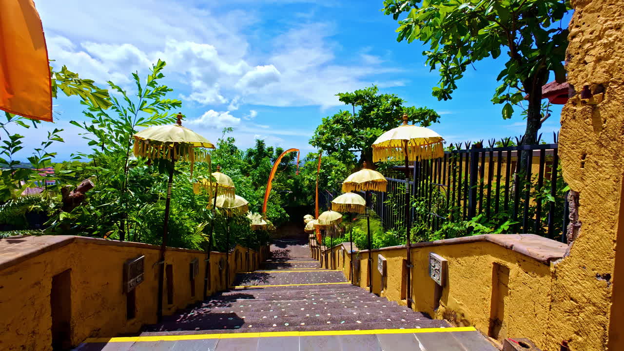 Decorated stairs with jungle in background in Indonesia
