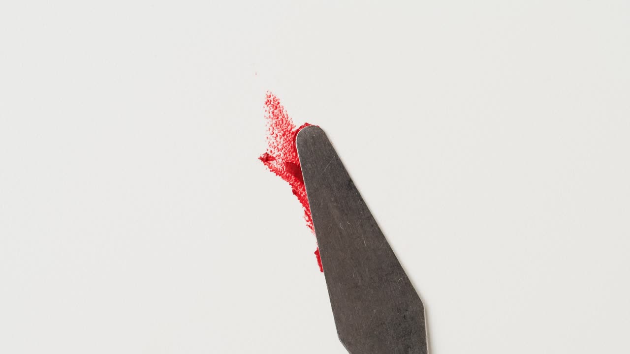 Applying Red Lipstick with Palette Knife