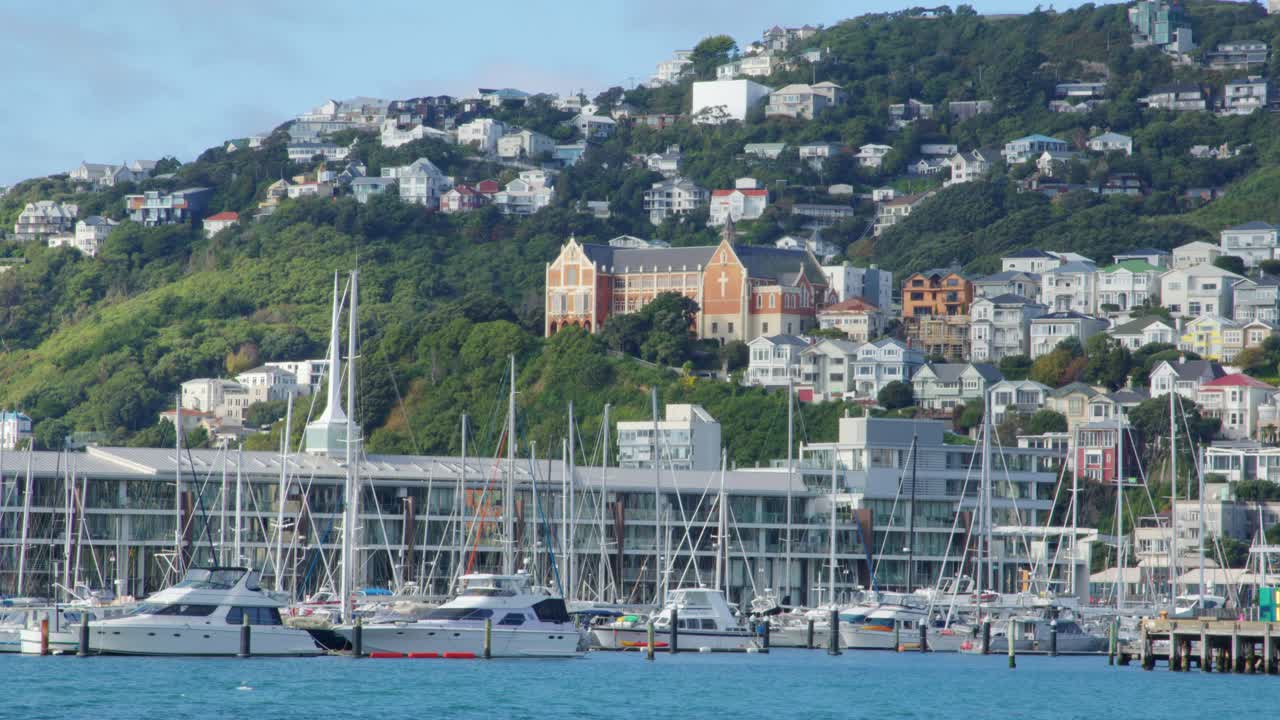 Wide shot of the Saint Gerard's church with Chaffers Dock in the foreground, Wellington, New Zealand