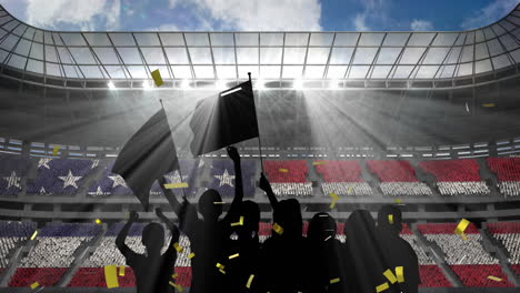 golden confetti falling over silhouette of fans cheering and sports stadium