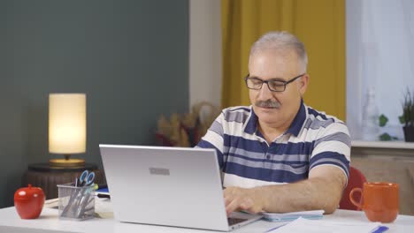 home office worker old man happy and cheerful.