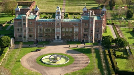 aerial view over hatfield country house courtyard with fountain and landscaped estate gardens