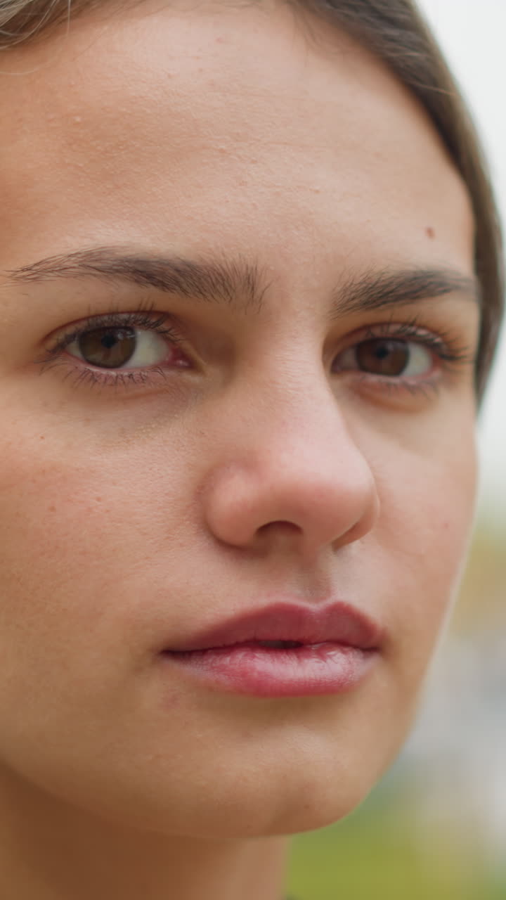 Portrait view of girl turning her face, visible rashes on skin, subtle expression, natural beauty with imperfections, emotional reaction, close-up of face with skin condition, candid moment