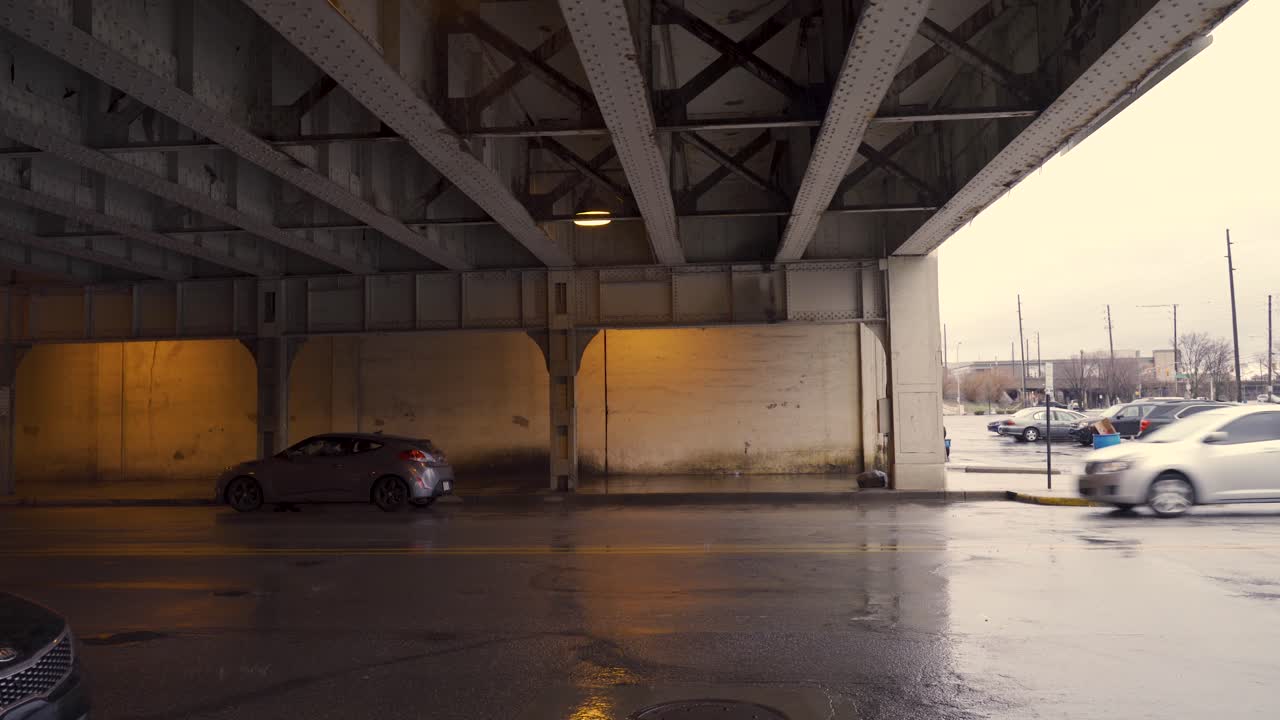 Cars driving under bridge in Indianapolis, Indiana