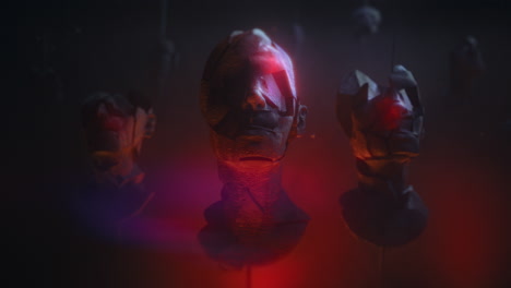 three crushed android heads on spikes in hell