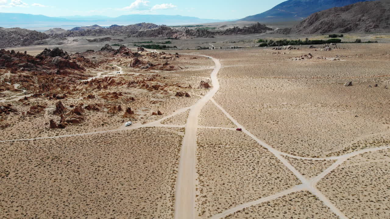 Aerial shot moving away from a beautiful dramatic landscape of the alabama hills in California USA