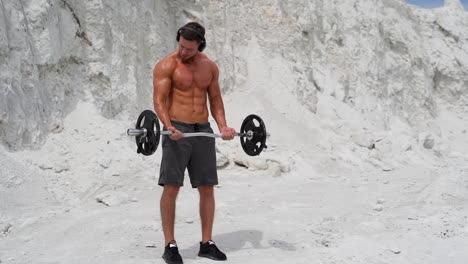 man exercising on nature. shirtless male model exercising outdoors