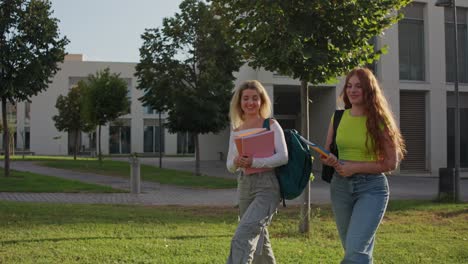 Two students walking on campus