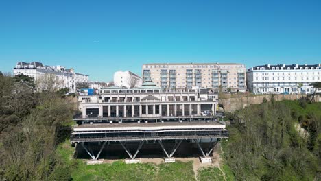 aerial ascent over leas cliff hall with folkestone skyline