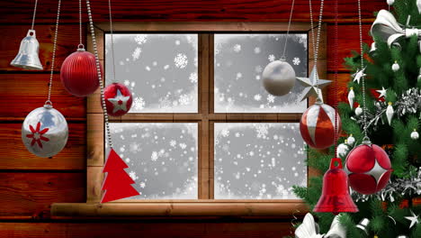 Animation-Von-Weihnachtskugeldekorationen-über-Dem-Fenster-Im-Winterlandschaftshintergrund