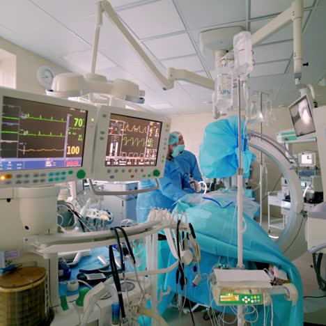 modern equipment in operating room. team surgeon at work in operating room. surgeon in operating room with surgery equipment.