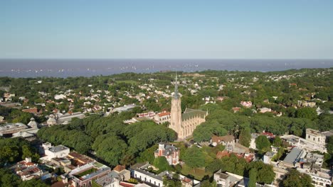 aerial view of san isidro neighborhood with its cathedral and la plata river at back