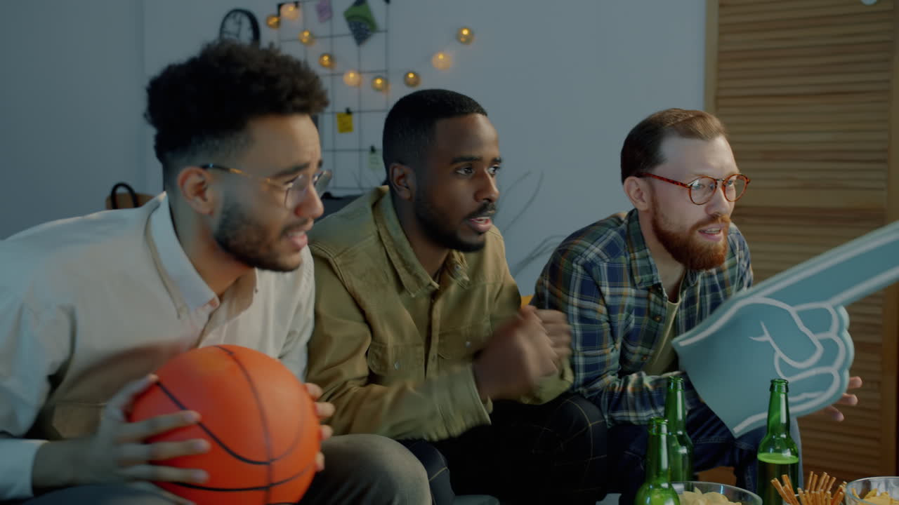 Friends Watching a Basketball Game