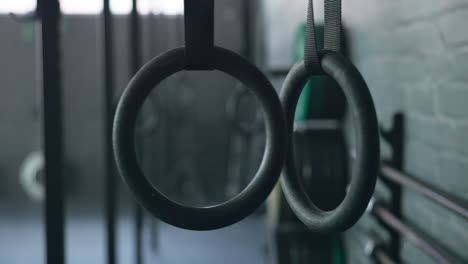 fitness, exercise and rings at gym for training