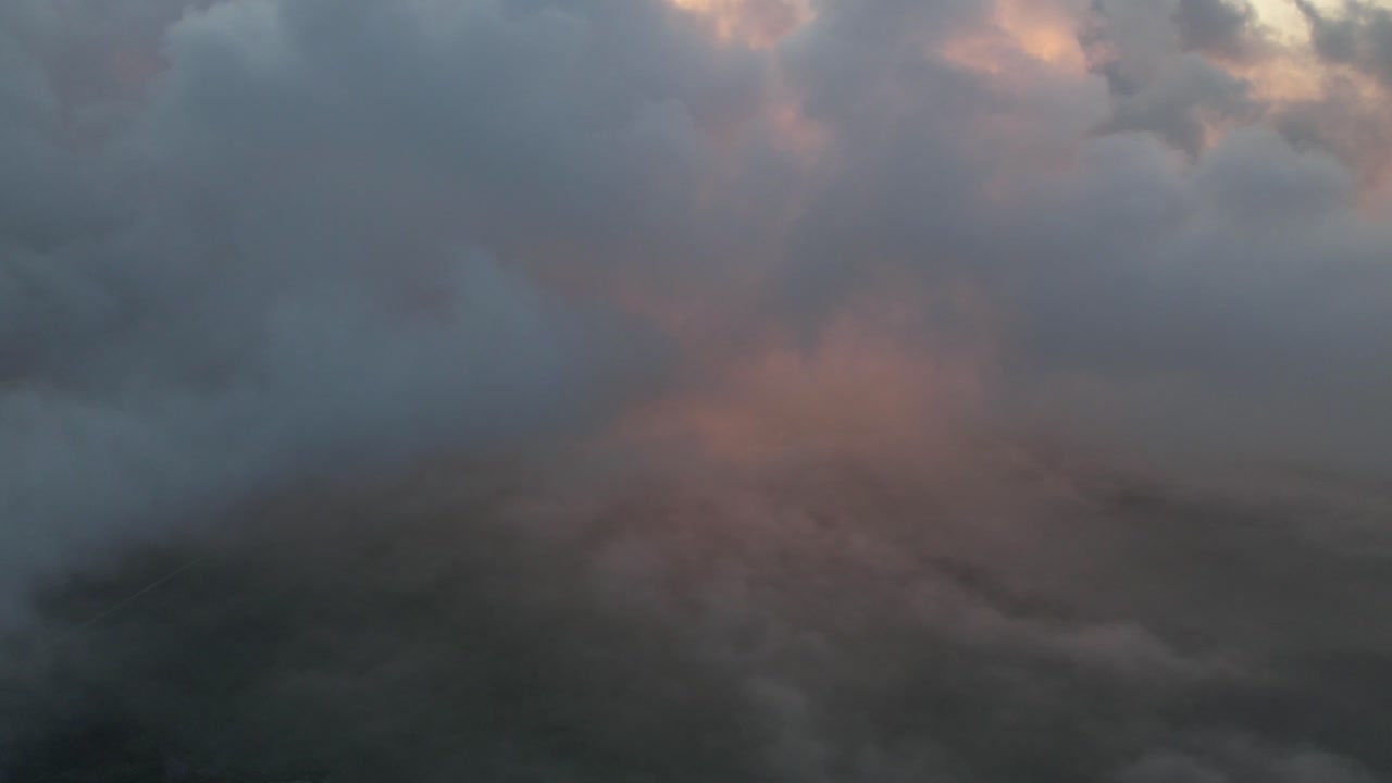 An aerial view high above the clouds during a beautiful sunrise-1