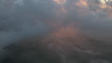 an aerial view high above the clouds during a beautiful sunrise-1
