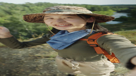 Asian Girl Filming Vlog on Mountain Peak