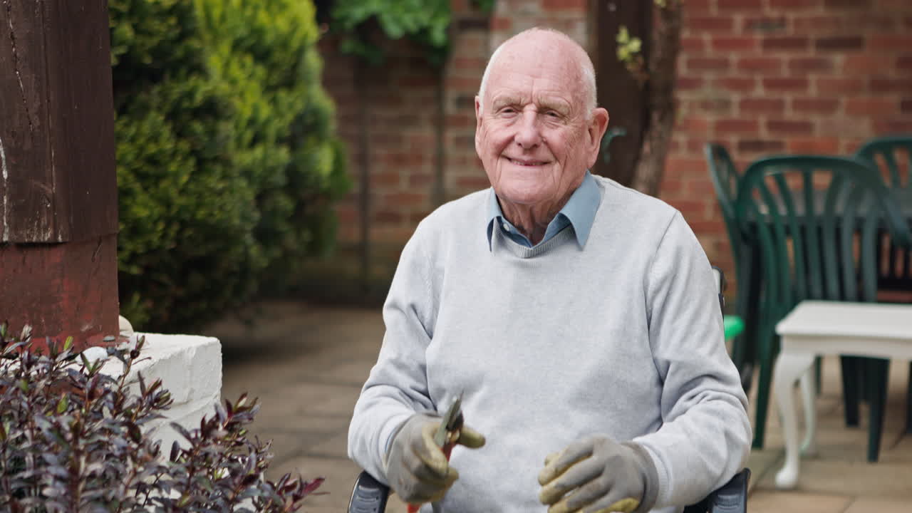 Senior man gardening in his backyard