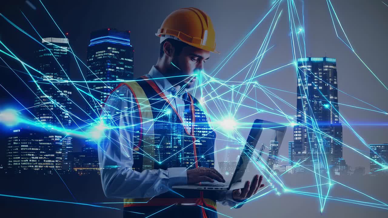 Engineer working on a laptop in a modern city