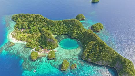 the blue lagoon, dinagat islands philippines - push in aerial drone view of this popular tourist location.