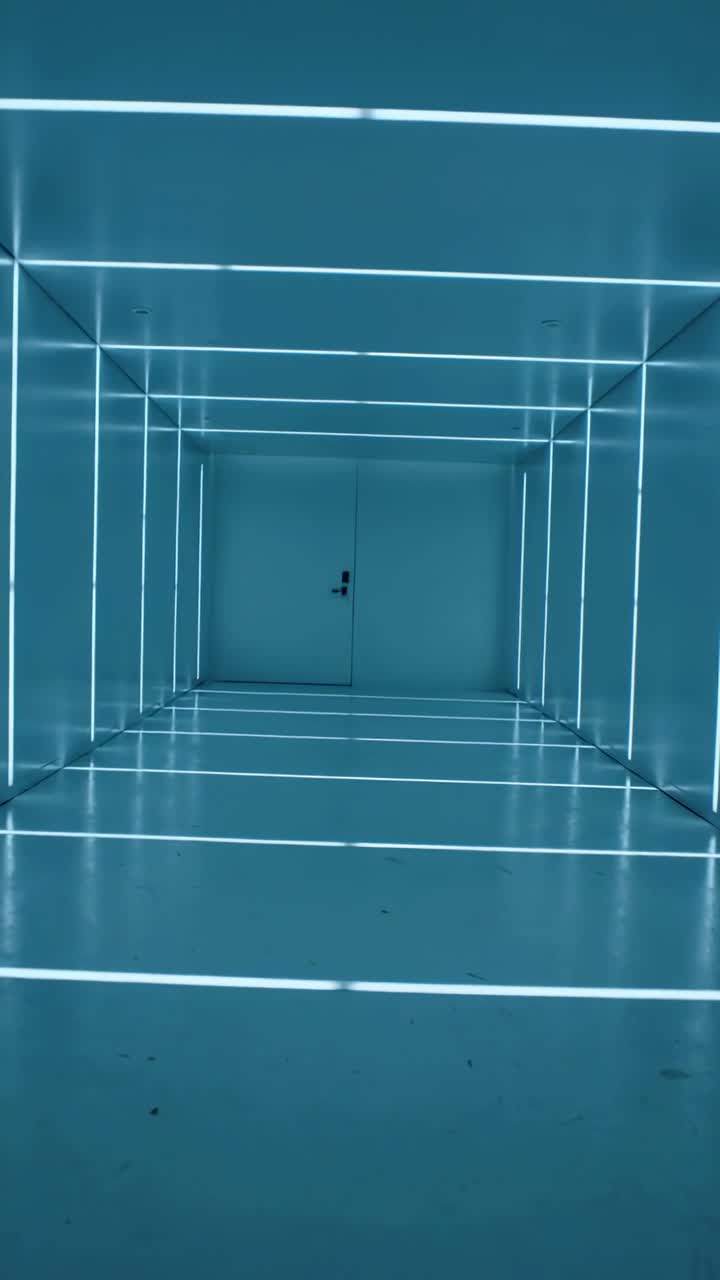 Vertical video: Rotating camera capturing lit corridor at gallery, showing LED grid, closed door