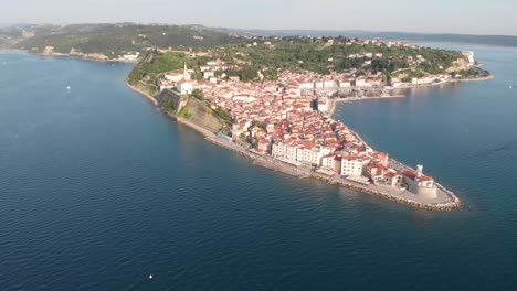 ancient buildings with red roofs and adriatic sea