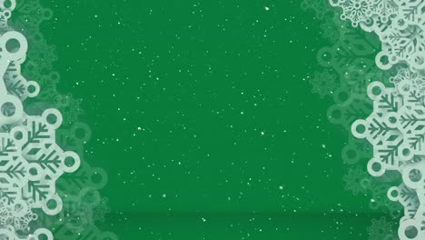 Animation-of-snow-falling-with-copy-space-on-green-background