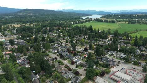 aerial view of fort langley residential houses in langley township, bc, canada. - pullback shot