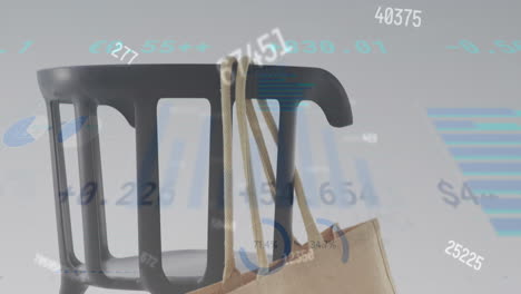 animation of changing numbers, graphs and trading board over bag hanged on chair