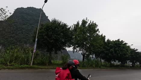 truck and motorbike pass by scenic landscape