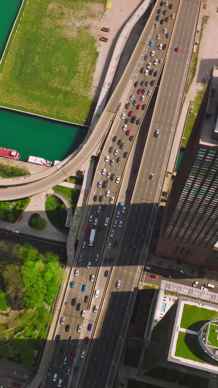 Beautifully designed city area nearby waterways. Fantastic skyscrapers neighboring Lake Michigan in Chicago city. Vertical video