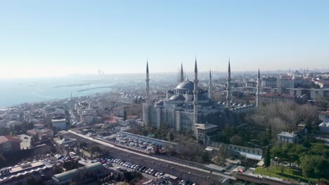 Blue-Mosque,-Sultan-Ahmed-Mosque,-Wide-Shot,-Süleymaniye-Mosque-in-distance,-Istanbul-Turkey,-Taksim,-Wide-Angle,-Pan-right,-Opening-Shot,-Cinematic,-50mm-Focal,-Facing-the-Sea-of-Marmara