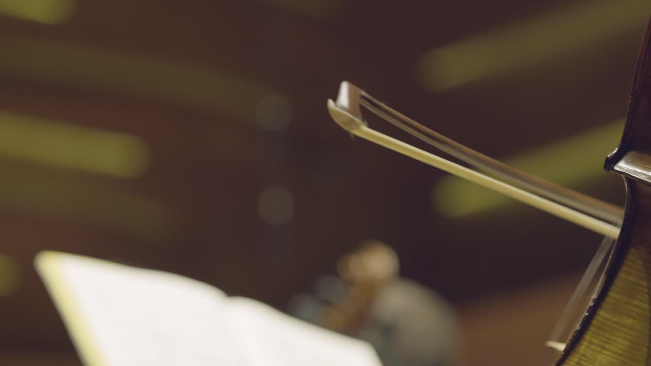 Playing a cello, very close