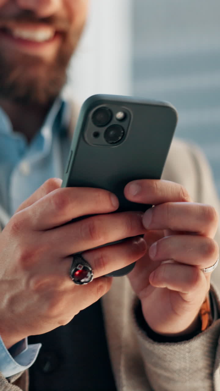 Man's Hands Scrolling and Typing on a Smartphone