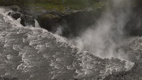 powerful waterfall stream in iceland detifoss aerisl slow motion