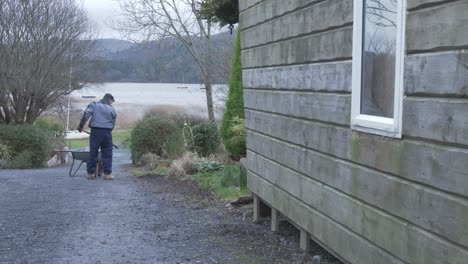 Landscaping-cleaning-edge-of-lawn-Slow-Zoom-Wide-Shot