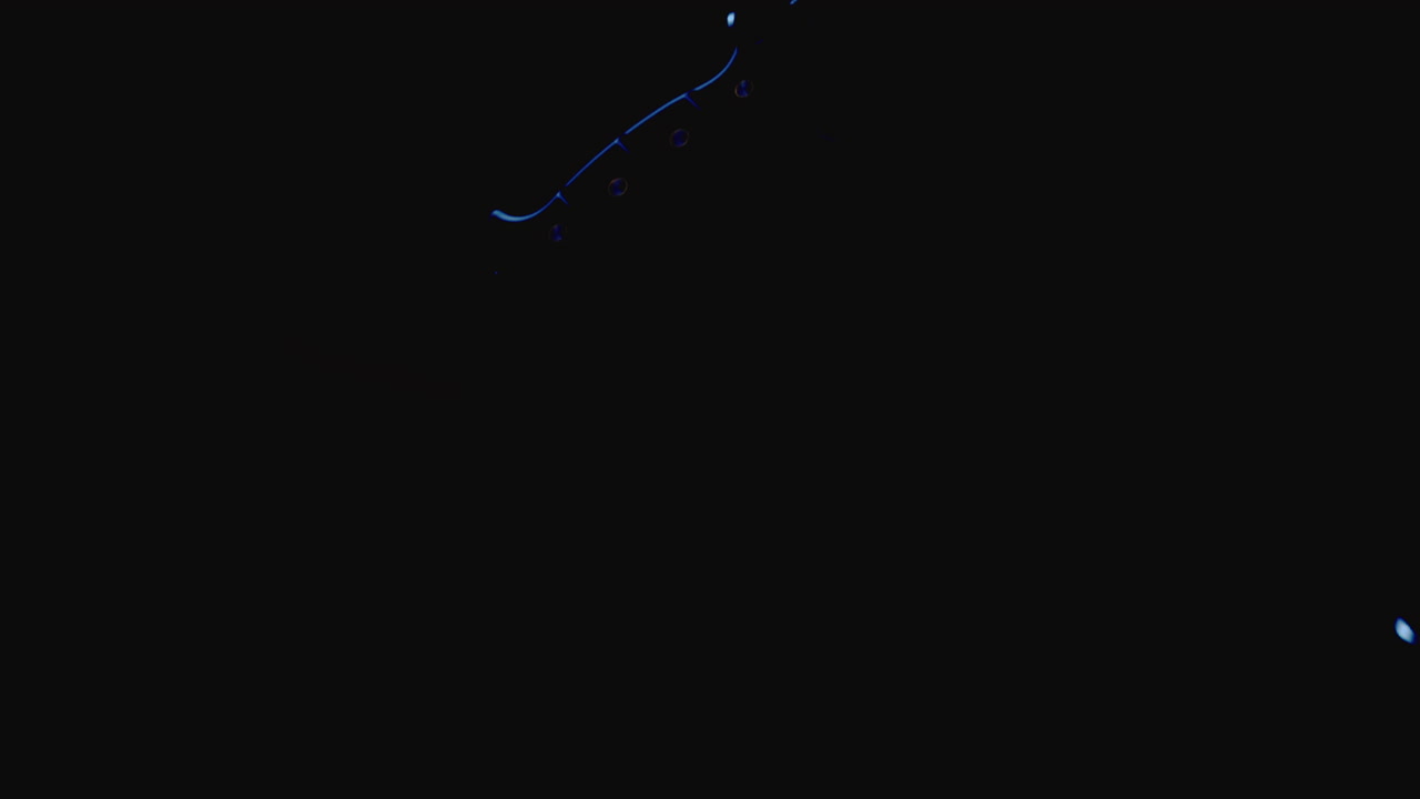 Knives on the dark background and in blinking red and blue light are falling in slowmotion