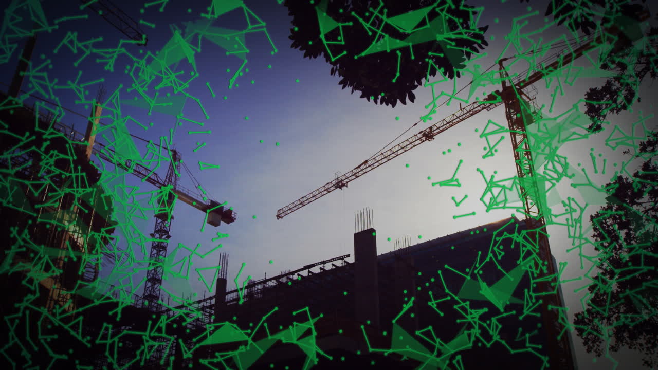 Cranes and building under construction with green geometric animation overlay
