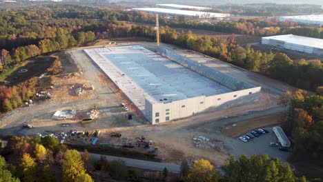 a long drone orbit showing off a construction site during a milestone