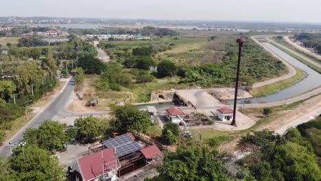 Aerial-View-of-Solar-Panel-on-Roof-of-Rural-Factory,-Thailand